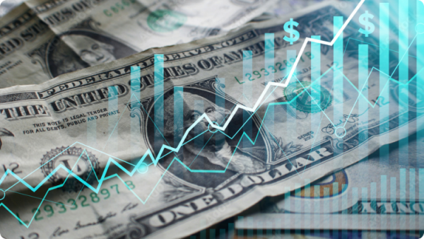 um gráfico de ações sobre notas de dólares americanos, ilustrando investimentos e lucros.